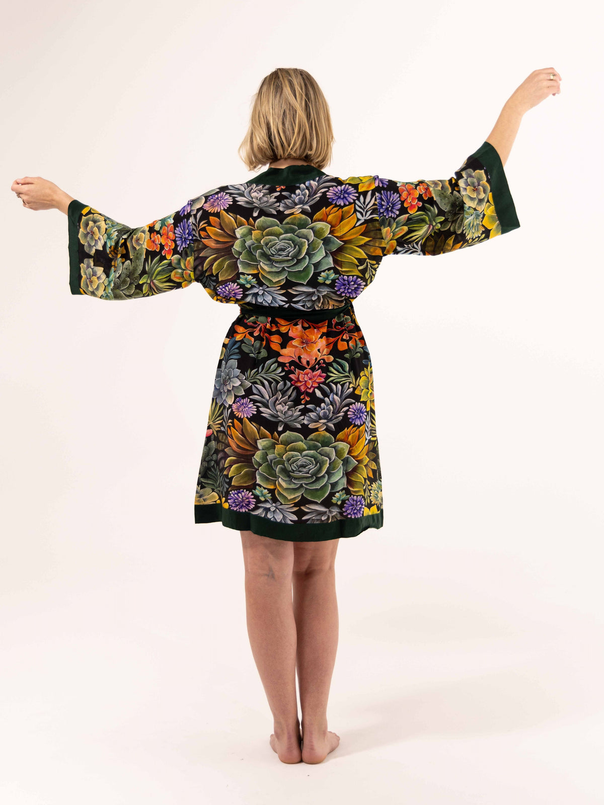 ALL•PORT silk robe in Succulent Symphony print by Lara Allport – back view with arms outstretched showing kimono sleeves