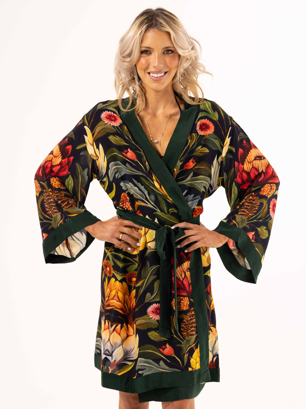 ALL•PORT silk robe in Artichoke Agape print by Lara Allport – front view close-up, hands on hips, belted