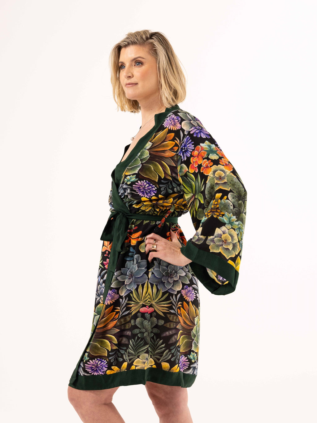 ALL•PORT silk robe in Succulent Symphony print by Lara Allport – three-quarter view, hand on hip, belted