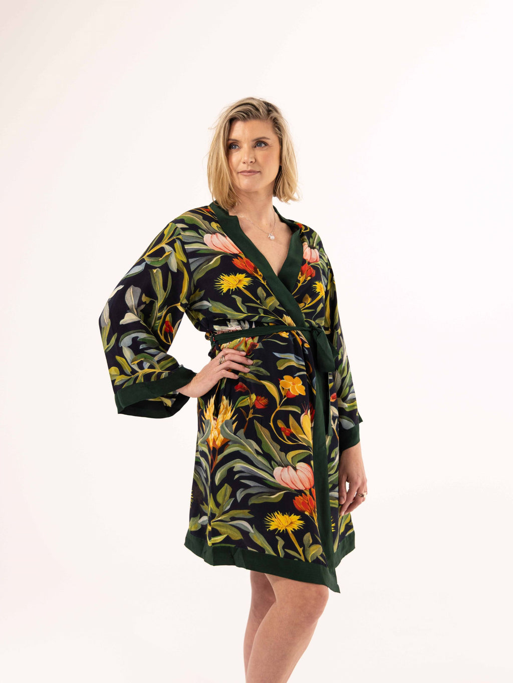 ALL•PORT silk robe in Dandelion Dreams print by Lara Allport – three-quarter view, belted, hand on hip