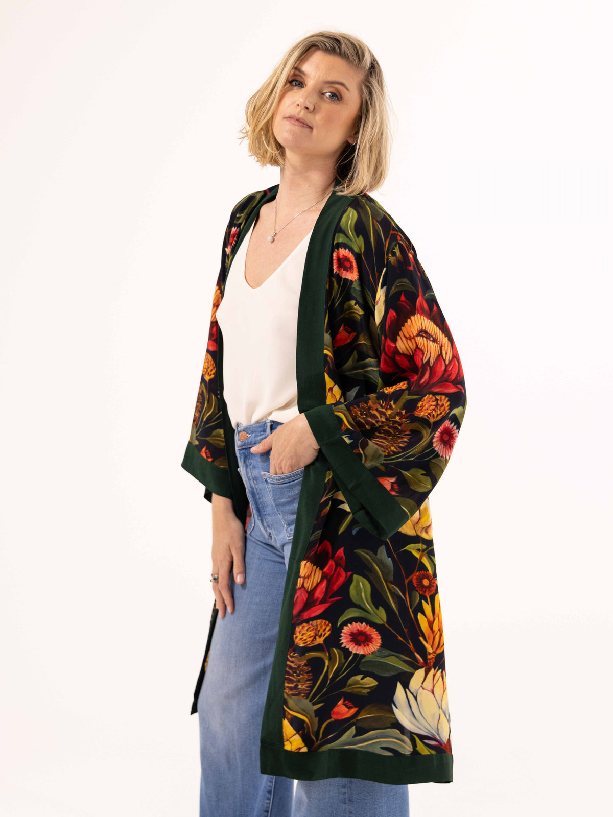 ALL•PORT silk robe in Artichoke Agape print by Lara Allport – worn open over a white singlet and jeans, three-quarter view