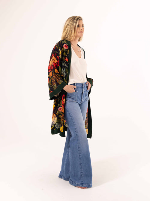 ALL•PORT silk robe in Artichoke Agape print by Lara Allport – worn open over a white singlet and jeans, side view