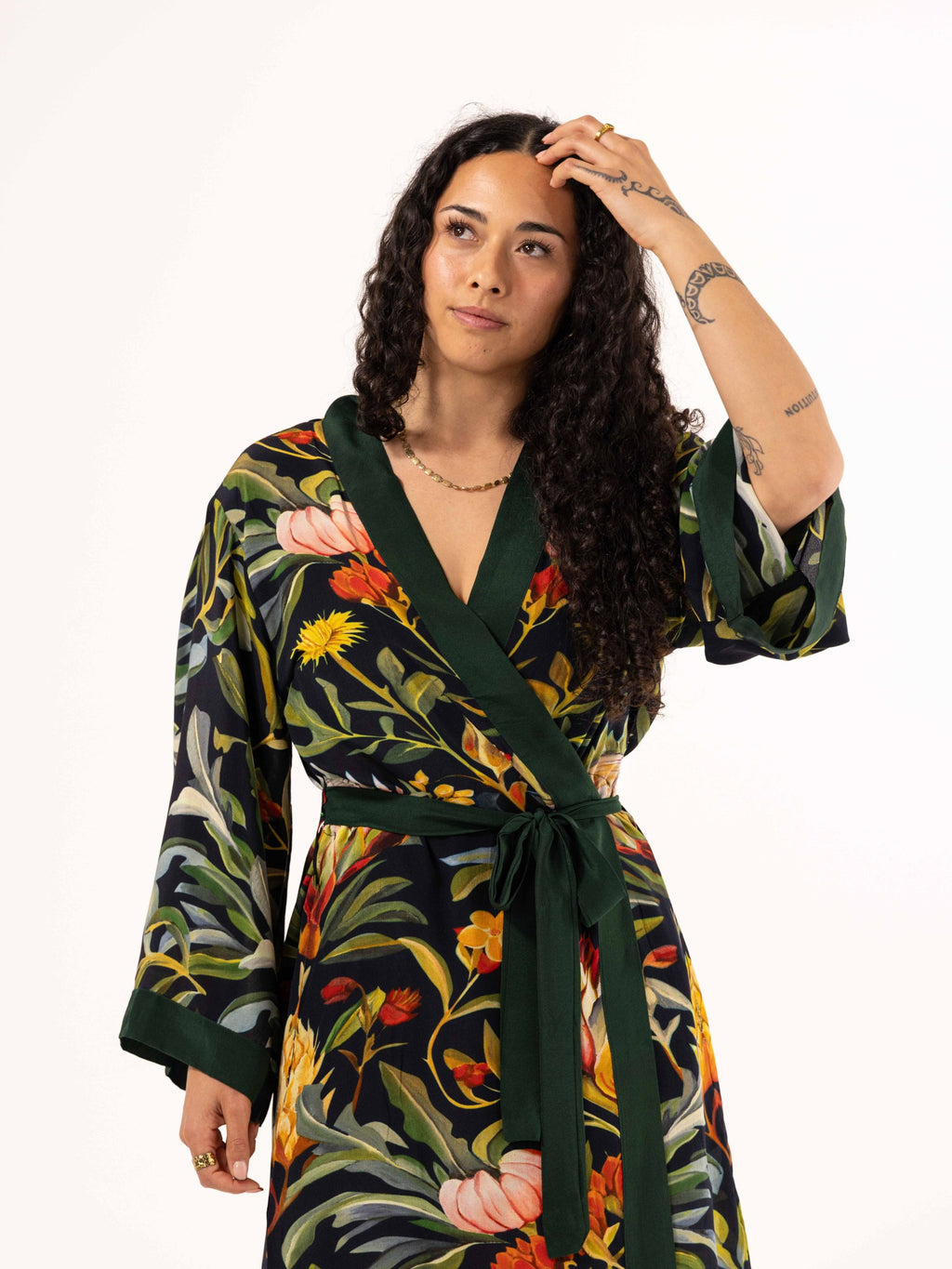 ALL•PORT silk robe in Dandelion Dreams print by Lara Allport – close-up of the front, green border and silk self-tie belt