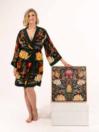 ALL•PORT silk robe in Artichoke Agape print by Lara Allport – front view standing beside the original Artichoke Agape painting
