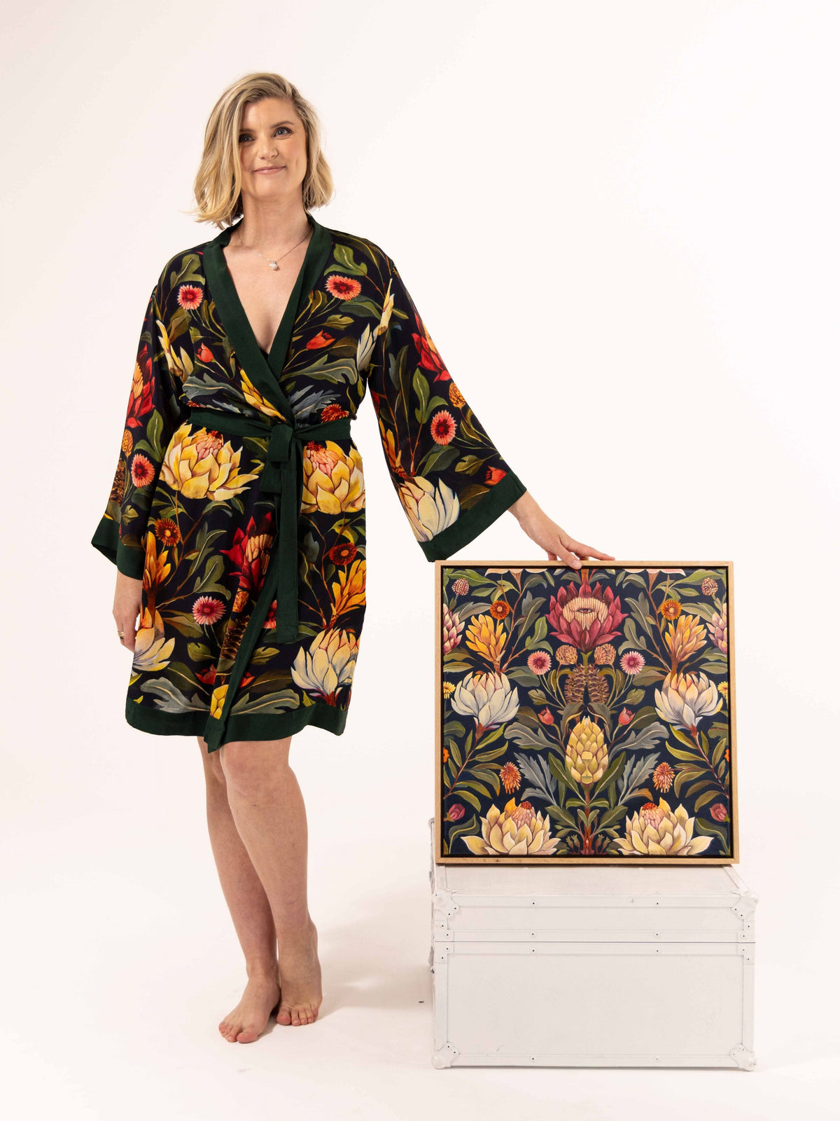 ALL•PORT silk robe in Artichoke Agape print by Lara Allport – front view standing beside the original Artichoke Agape painting