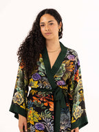 ALL•PORT silk robe in Succulent Symphony print by Lara Allport – close-up of the front, green border and silk self-tie belt