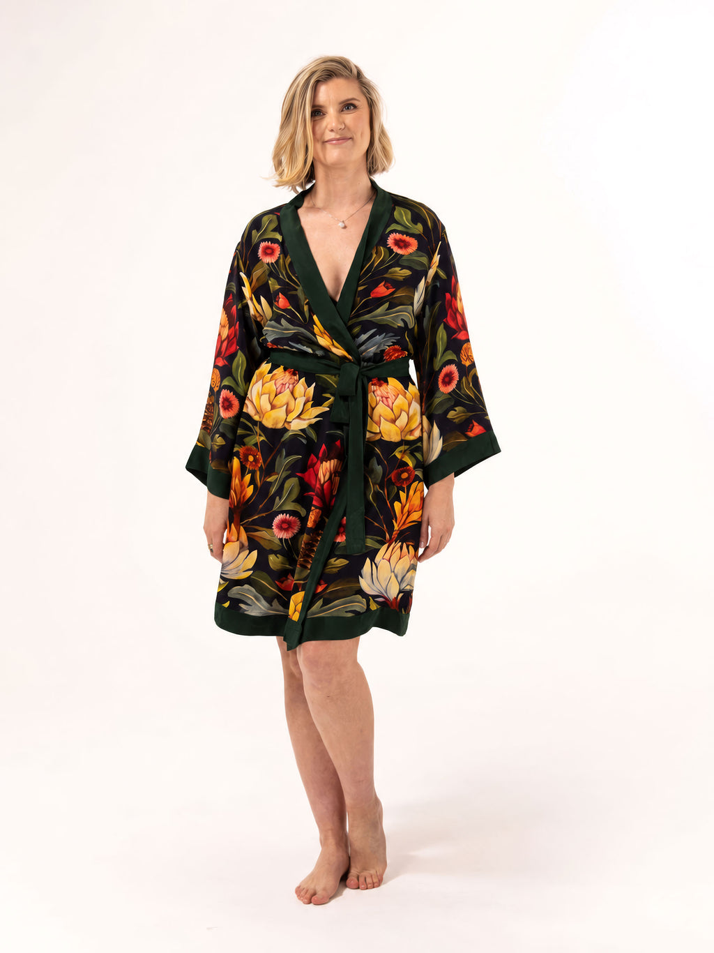 ALL•PORT silk robe in Artichoke Agape print by Lara Allport – front view, tied at the waist, knee length with dark green trim
