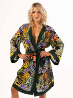 ALL•PORT silk robe in Succulent Symphony print by Lara Allport – worn open over swimwear, hands on hips, front view